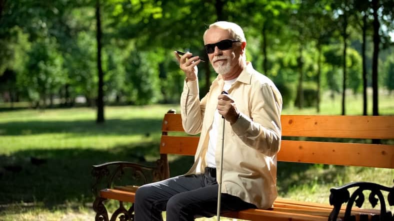 Blind man using smartphone